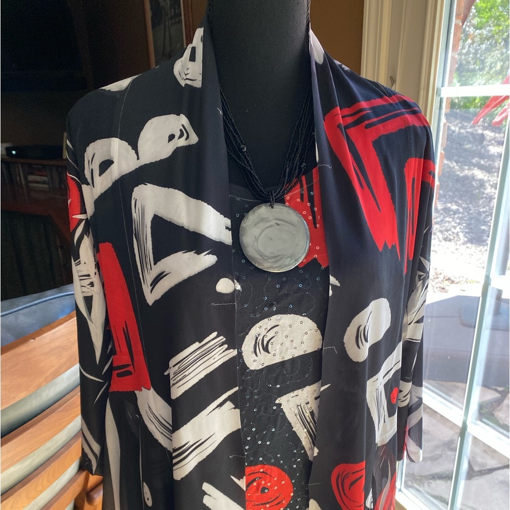 Jacket and matching shell.  Worn once.  Like new.  Necklace is sold separately.